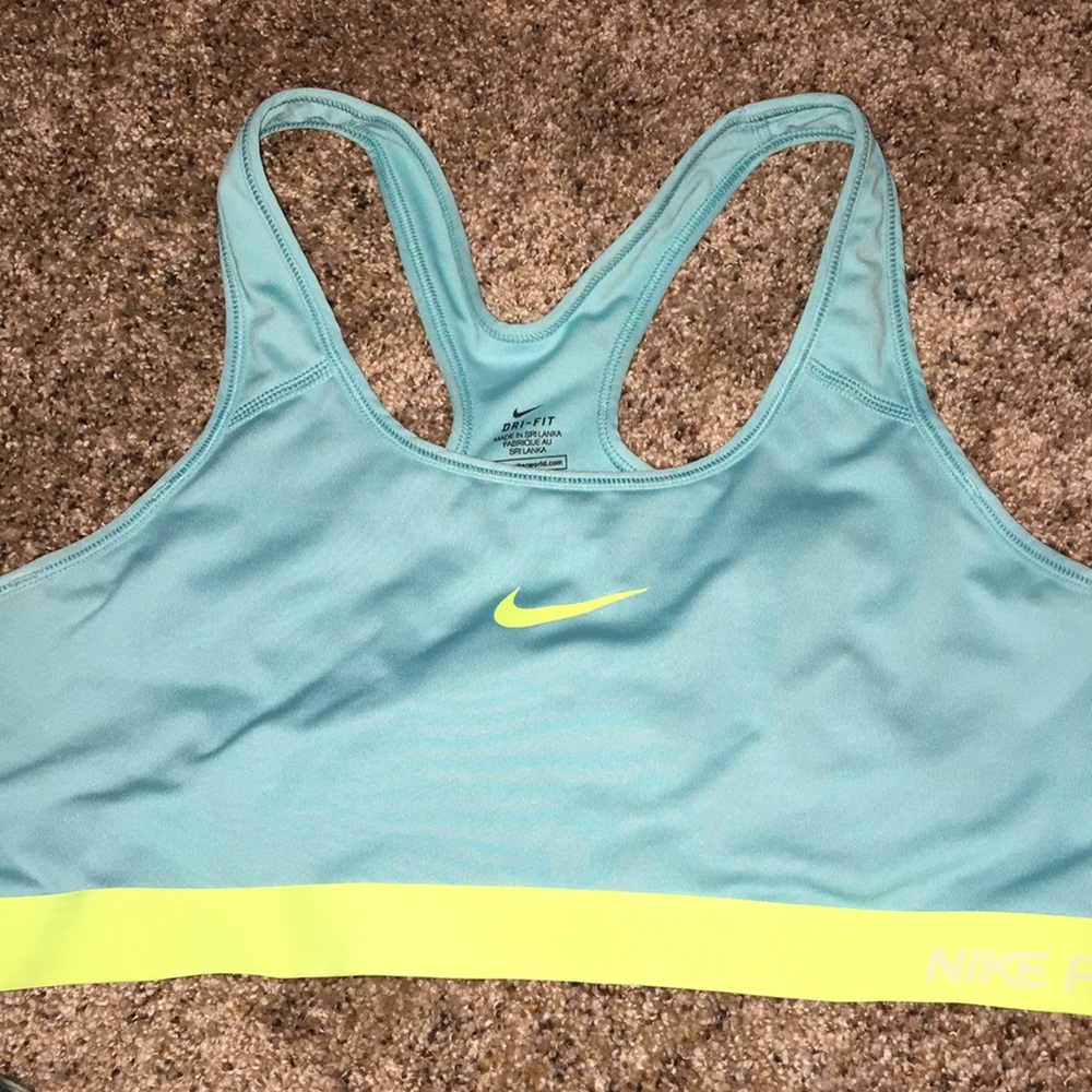 Blue and yellow Nike sports bra
